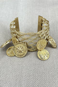 Gold bracelet with coin charms