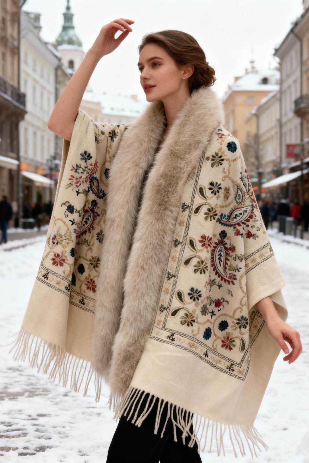 Woman wearing a decorative shawl with fur trim.